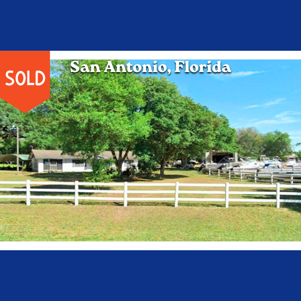Sold photo in San Antonio, FL -House Land with white picket fence
